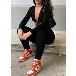 NWOT V Neck Long Sleeve Cut Out Jumpsuit